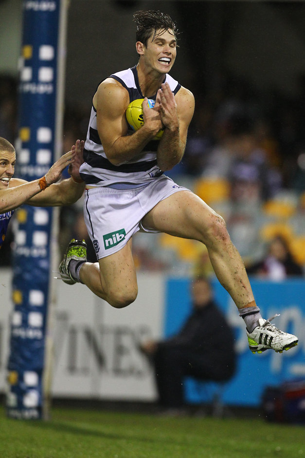 AFL 2012 Rd 05 - Brisbane v Geelong Tom Hawkins of Geelong marks during the AFL Round 05 match between the Brisbane Lions and the Geelong Cats at the Gabba, Brisbane. (Photo: Patrick Hamilton/AFL Media)